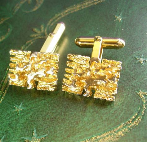 dior gold cufflinks